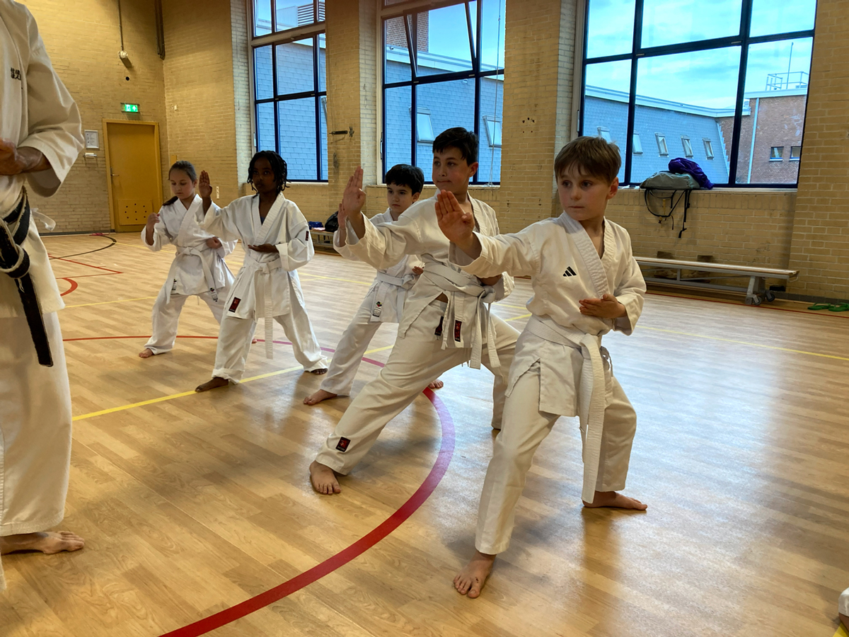 Shuto uke in Kokutsu dachi - Kids Karate Klas at ki club cool Amsterdam - Jordaan